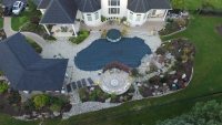 Overhead shot of underground pool protected with pool cover
